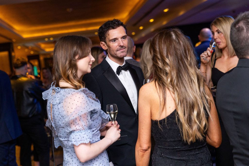 4 people talking 